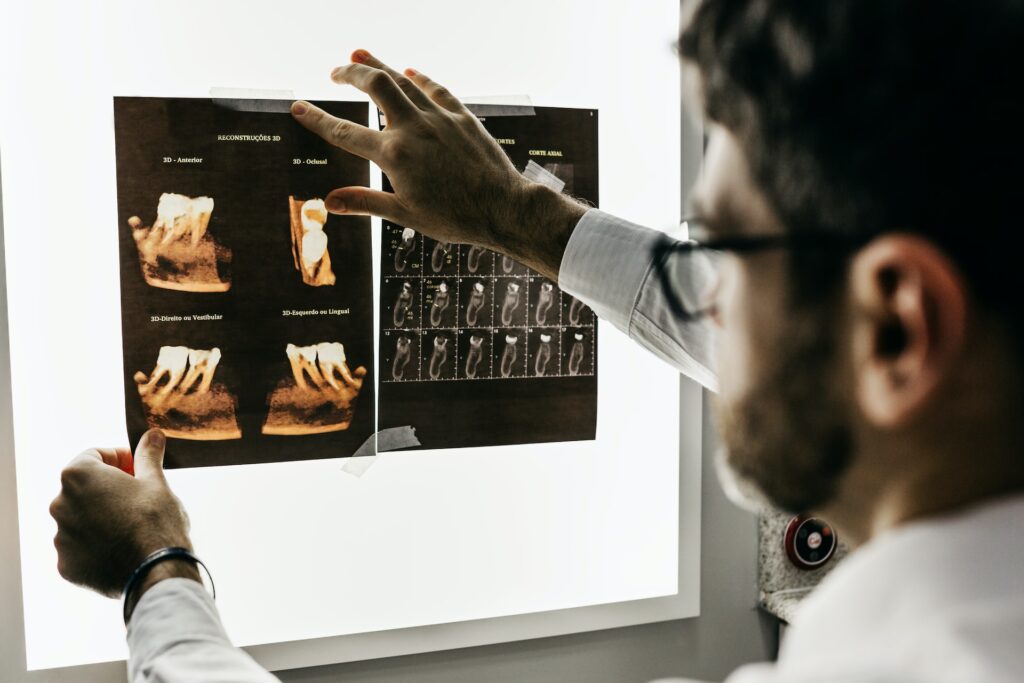 dentist looking at records