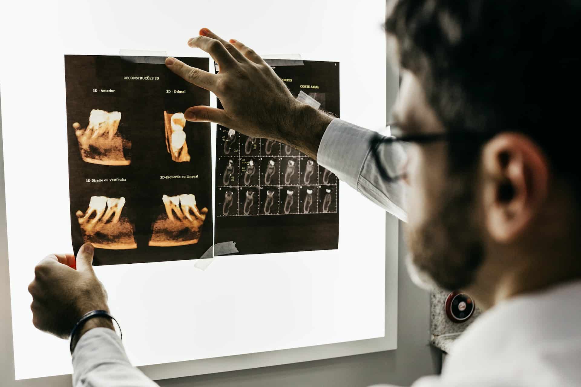 dentist looking at records