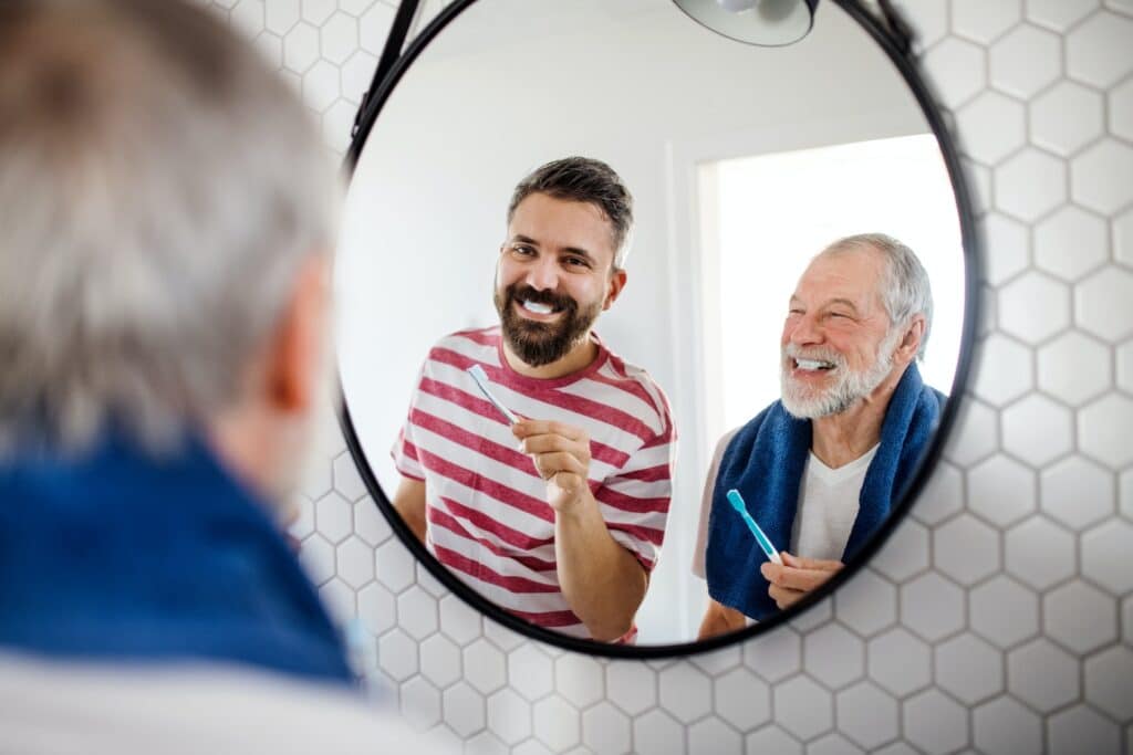 men brushing teeth