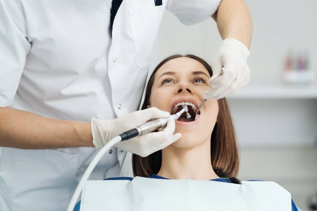 woman having a dental cleaning
