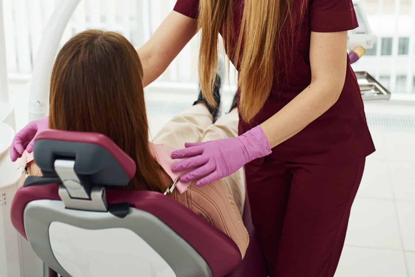 dentist talking to patient