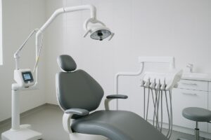 Modern periodontal operatory with a soft tissue laser device and patient chair