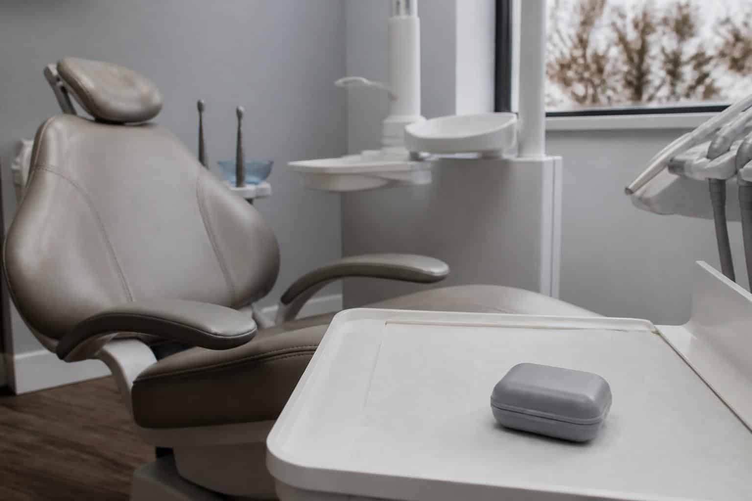 Closed night guard case on a dental instrument tray